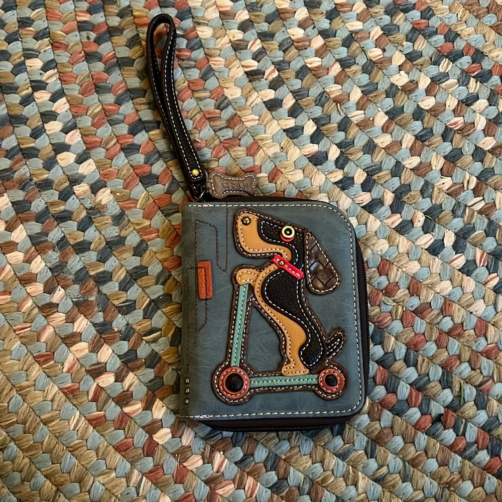 Chala Dog on a scooter wallet
